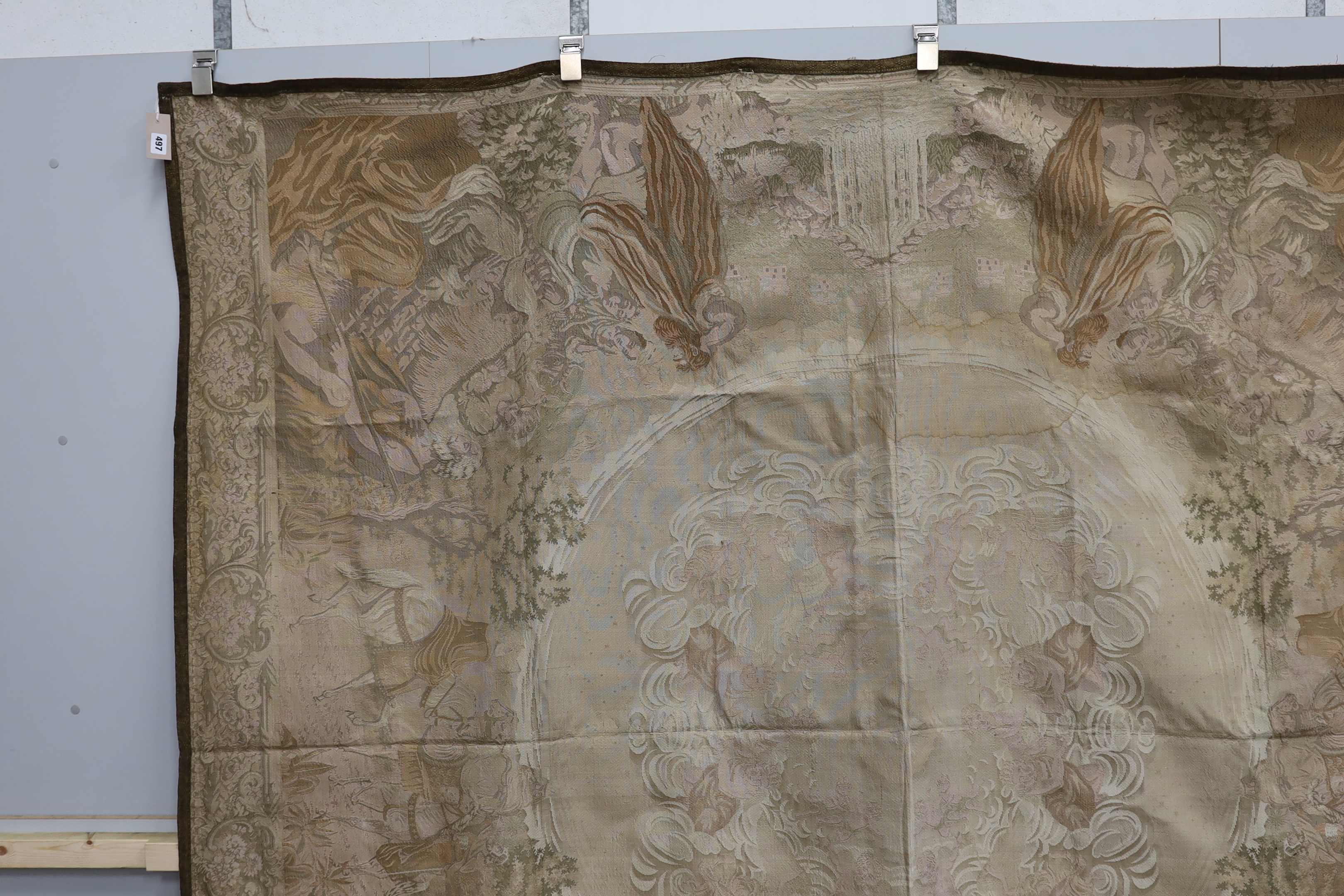 A metallic woven machine tapestry edged in metallic braiding, the tapestry depicting various scenes from the nativity, 225cm x 200cm